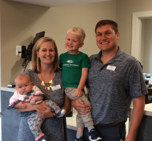 <em>Kendall, Evie Kate, Luke and Eli Younger welcome customers to the new Christian Brothers Automotive in Trussville.</em>