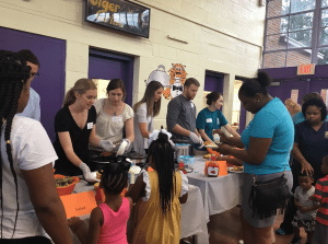 <em>Volunteers from Briarwood Presbyterian serve dinner to Foundations’ parents. Other churches that volunteer and/or provide financial support include Cathedral Church of the Advent, Independent Presbyterian, Altadena Valley Presbyterian, Oak Mountain Presbyterian and Christ Church.</em>