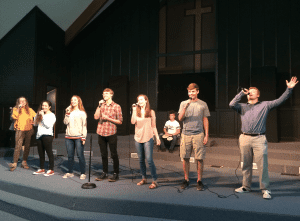 <em>Kingwood senior Cade Horton (far right) has been a part of the school’s Praise and Worship Team since 6thgrade. The group leads worship every Thursday morning during chapel services.</em>