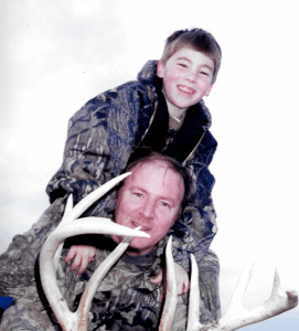 Deer hunting can be an awesome time spent between father and son. Seen here is Mark Whitlock, Jr. with his Dad Mark Whitlock, founder of Mark’s Outdoors. Circa. 1999.