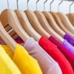 bigstock Fashion clothes hanging on clo 229850923