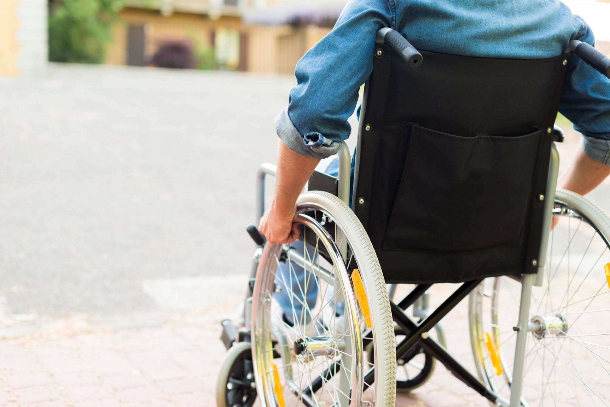 healthy living 101 mobility person in wheelchair approaching house featured image for article on ramps sept 18 bcf