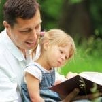 bigstock Father and daughter reading 33993602