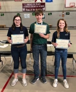 Prince of Peace Catholic School’s 2019 Geography Bee winner Douglas Frederick (center) and runners-up Sara Sypeck (left) and Laura Granger (right).