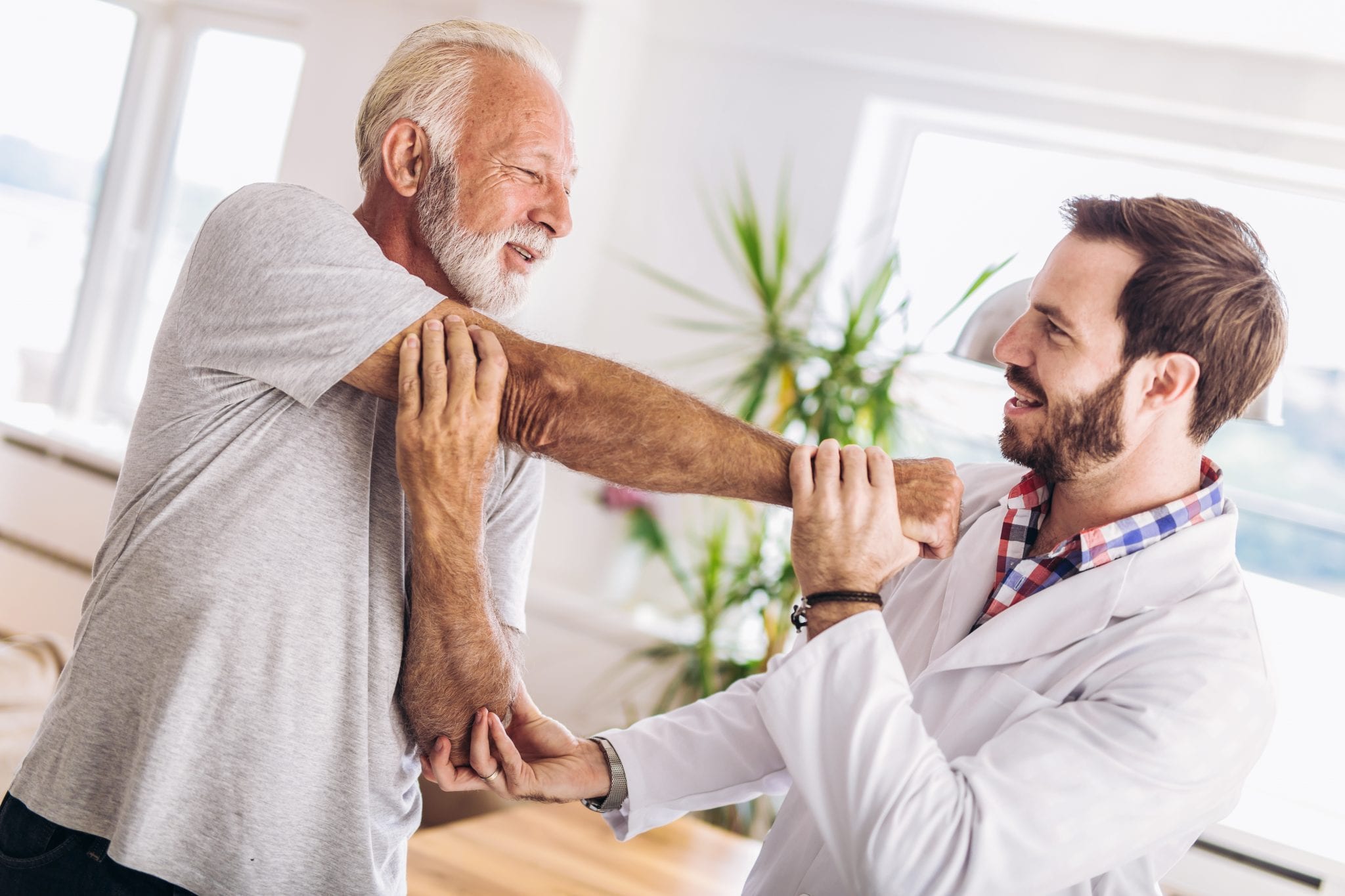 bigstock Man Having Chiropractic Arm Ad 257344495