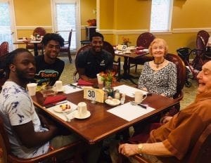 Brookdale University Park Senior Living residents and Samford students enjoy a morning together.