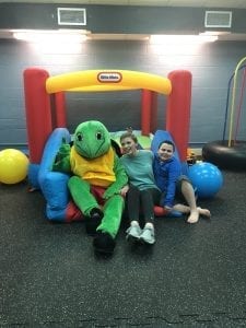 IsabellaPowell and her brother David, age 10, enjoying the Calera Intermediate sensory room. Powell says, “Seeing my brother rise from first making D’s and F’s to now making A’s in school seems like a dream come true.”