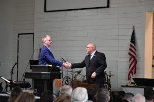 Scott Gurosky and Pastor of First Baptist Church of Sutherland Springs, Frank Pomeroy, shake hands at the new building dedication ceremony. Pastor Pomeroy lost his 14-year-old daughter, Annabelle, during the shooting.  Photo Credit: Jane Rodgers, North American Mission Board