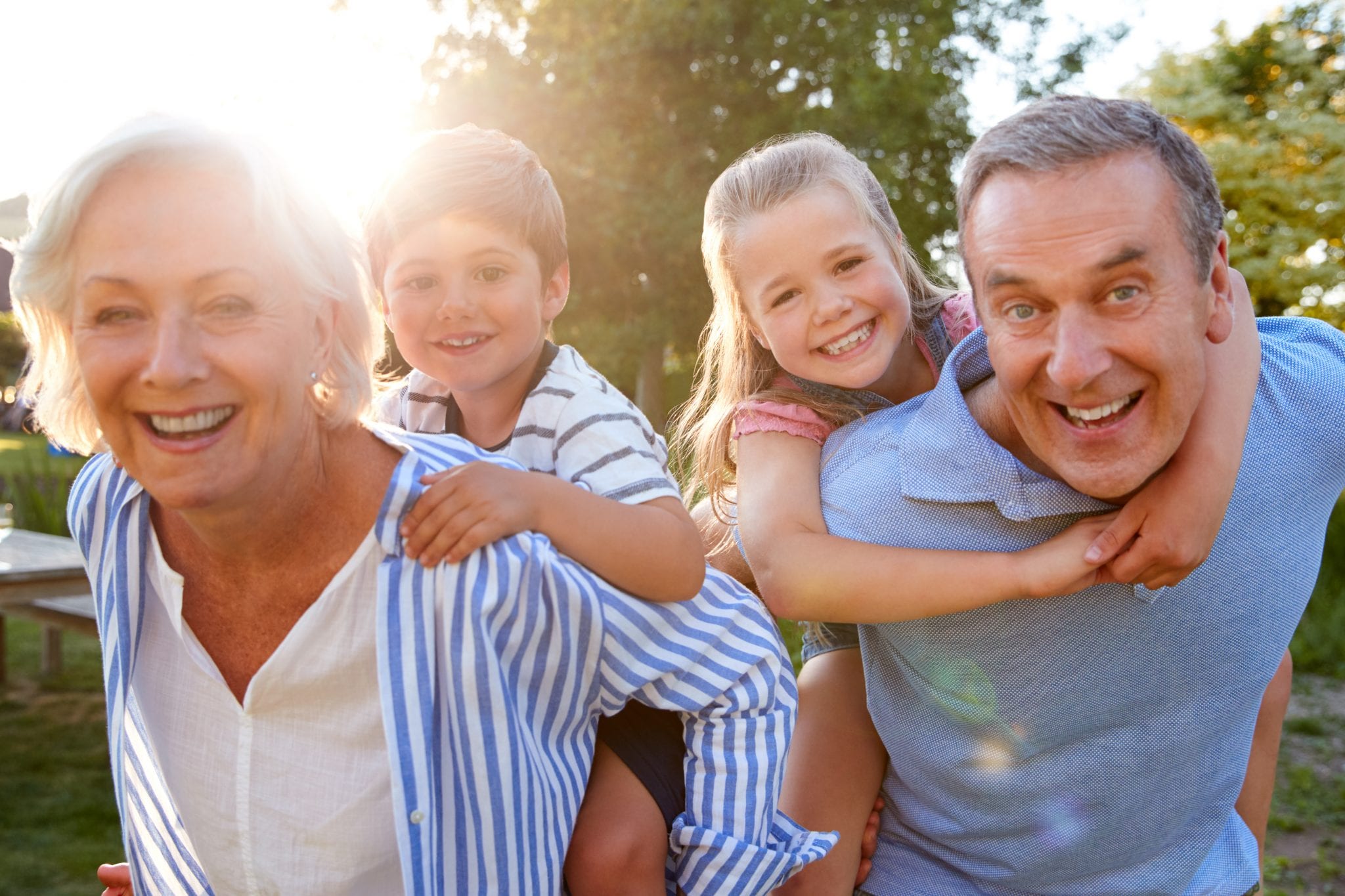 bigstock Portrait Of Smiling Grandparen 260598928