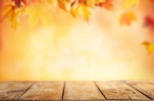 bigstock Wooden table and blurred Autum 316665085