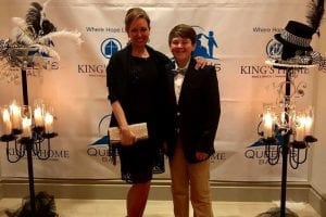 Kings Home Queens Ball mom and son kings home backdrop