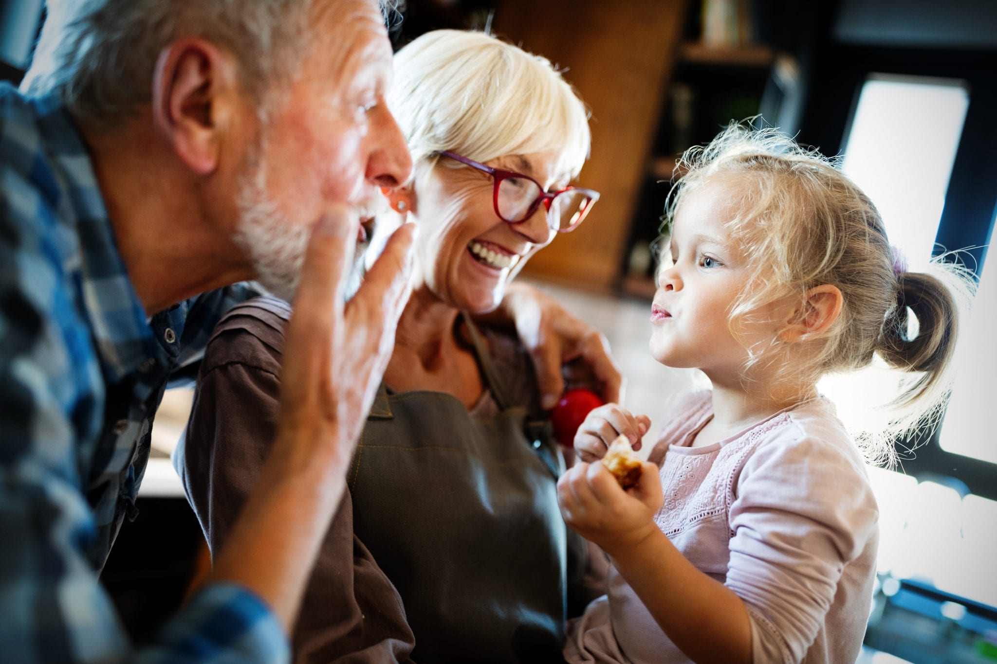 bigstock Happy Grandparents With Grandc 355174133