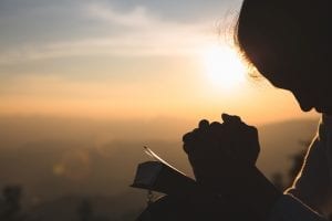 bigstock Woman Praying In The Morning O 343590727