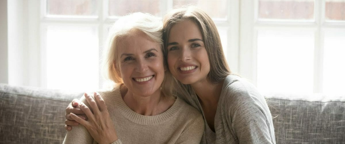 bigstock Smiling Senior Mom Posing At H 339239446