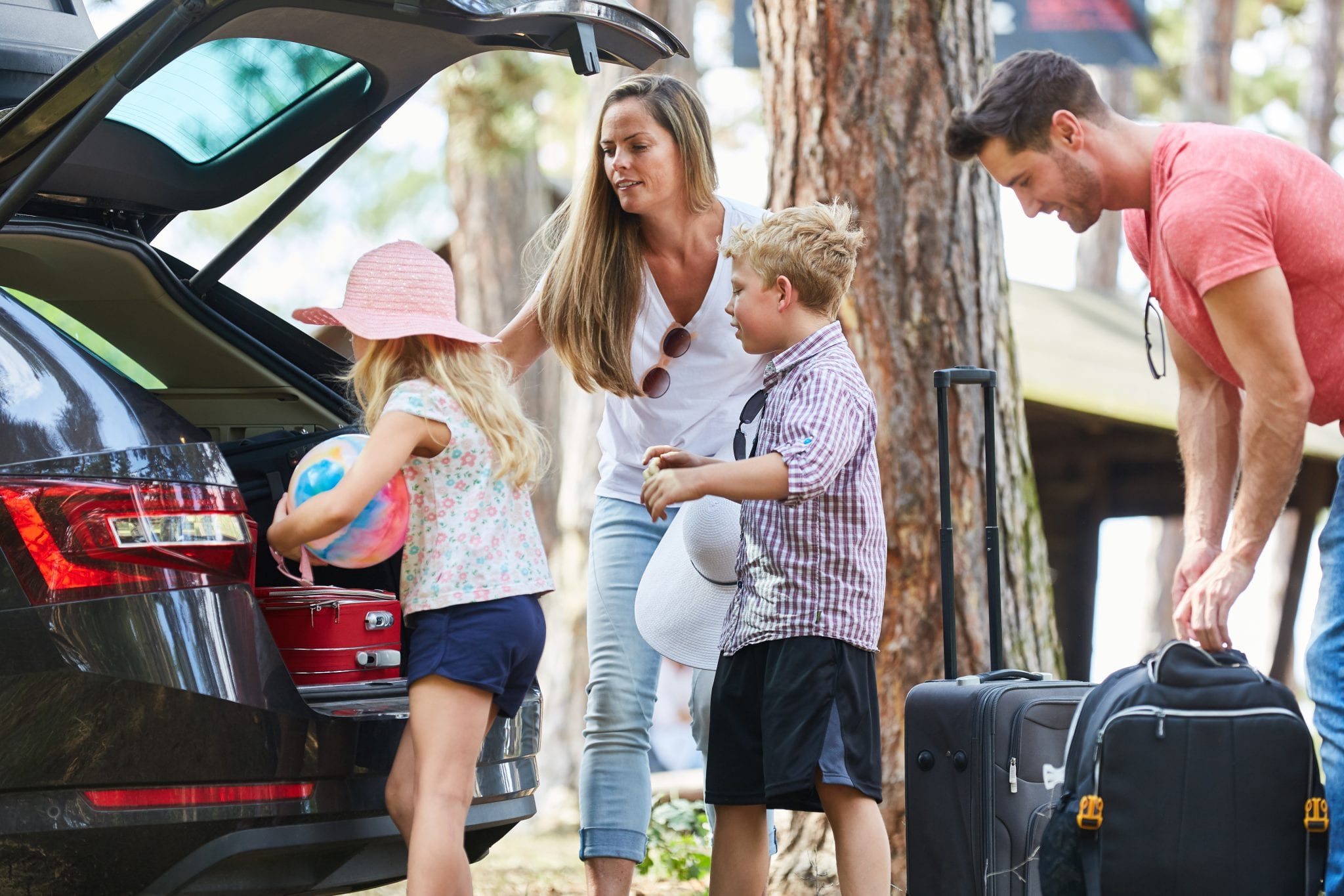 bigstock Family and children load car w 289158649