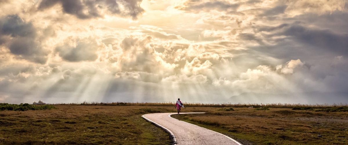 bigstock A Person Walking Alone Along S 276271147