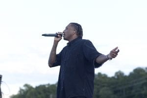 Lecrae Singing on Stage