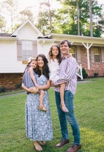 Adam Wrights Family Outside of their Home