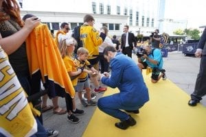 Rocco Grimaldi signing jerseys for fans