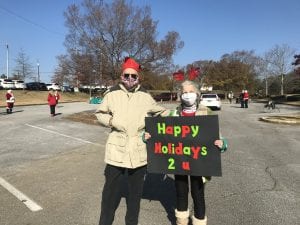 Hoover Seniors Holding Festive Signs Outside