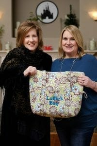 Laurie and Cheryl holding the grandmother tote