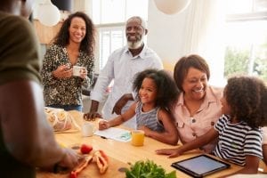 Grandparents Sitting At Table