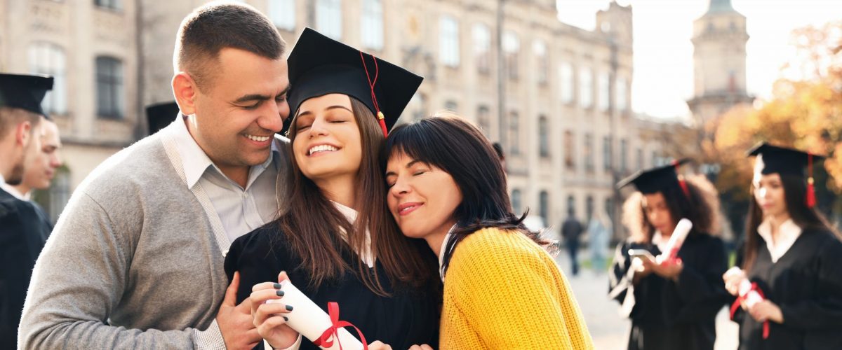 bigstock Happy Student With Parents Aft 329608783