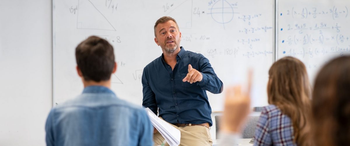 bigstock Professor pointing at college 390488804