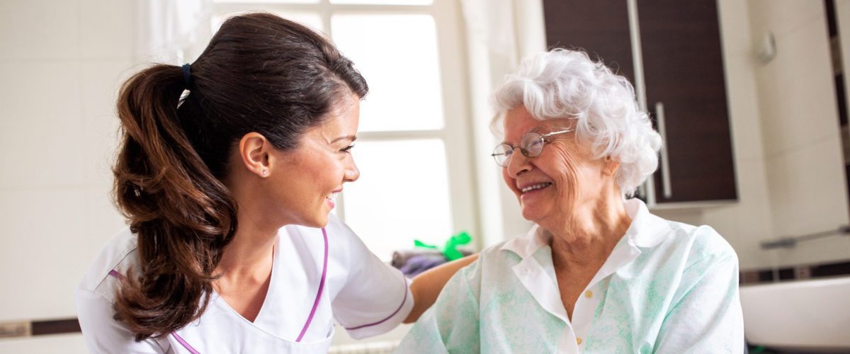 bigstock Nurse Attending Senior Woman I 403387559