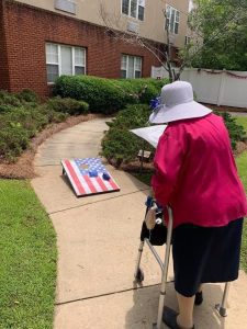 Brookdale resident playing corn hole