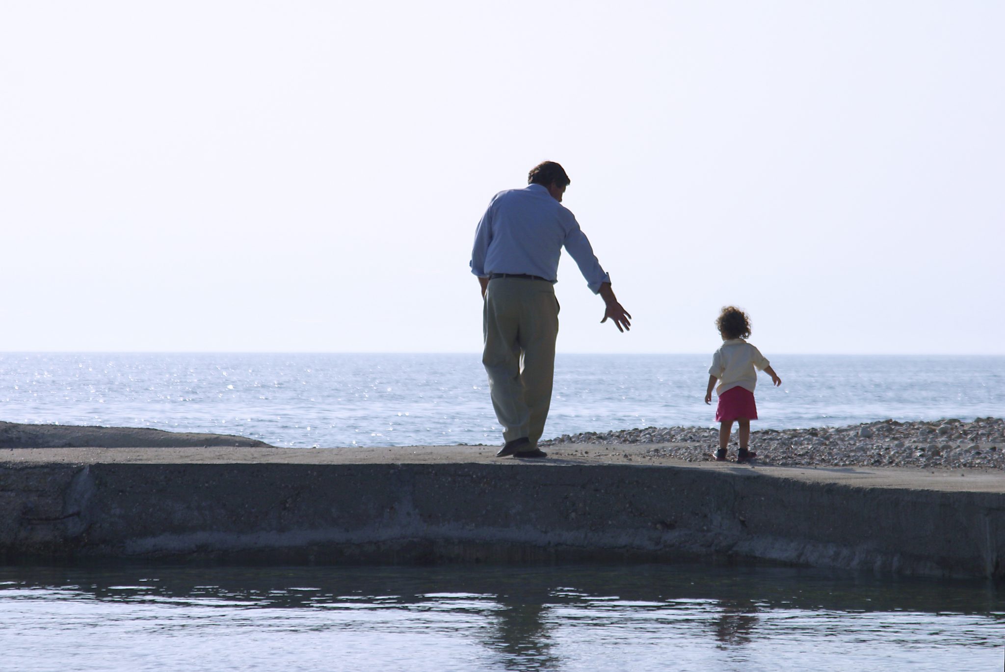 bigstock father and son by the sea refl 20318231