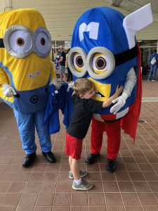 Minion and Child hugging