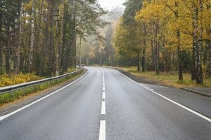 bigstock Road In The Autumn Forest Hig 436703849