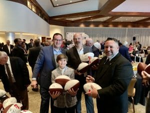 Letterman of the USA Group with footballs