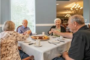Brookdale residents eating together