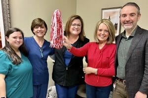 Pam in hospital with nurses