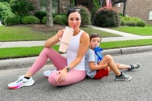 Heather and son drinking water