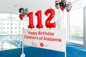 Childrens of Alabama turns 112 sign