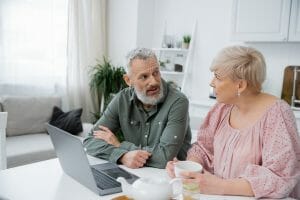 bigstock Middle Aged Couple Talking Nea 474947357