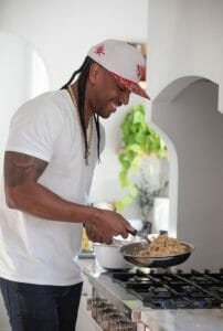 Darnell SuperChef Ferguson cooking in kitchen, Photo Credit Tyndale House Publishers