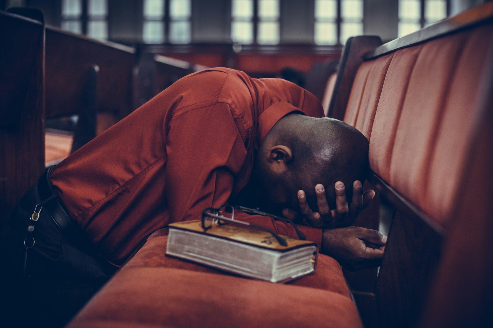 Man praying in church