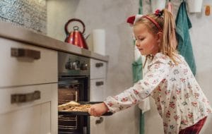 Little girl making cookies