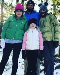 Walt and daughters playing in snow