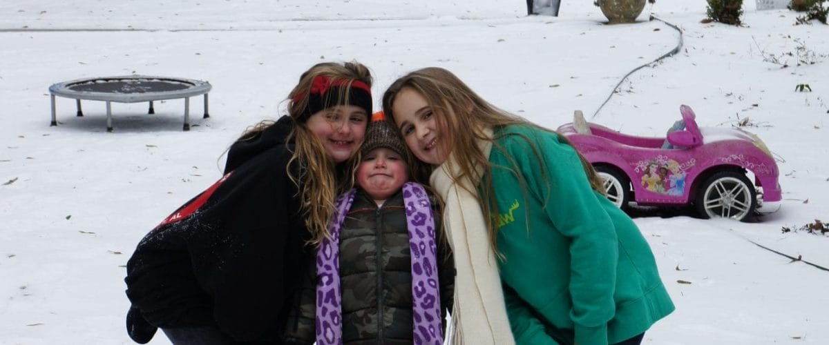 Walt Merrell's daughters in snow