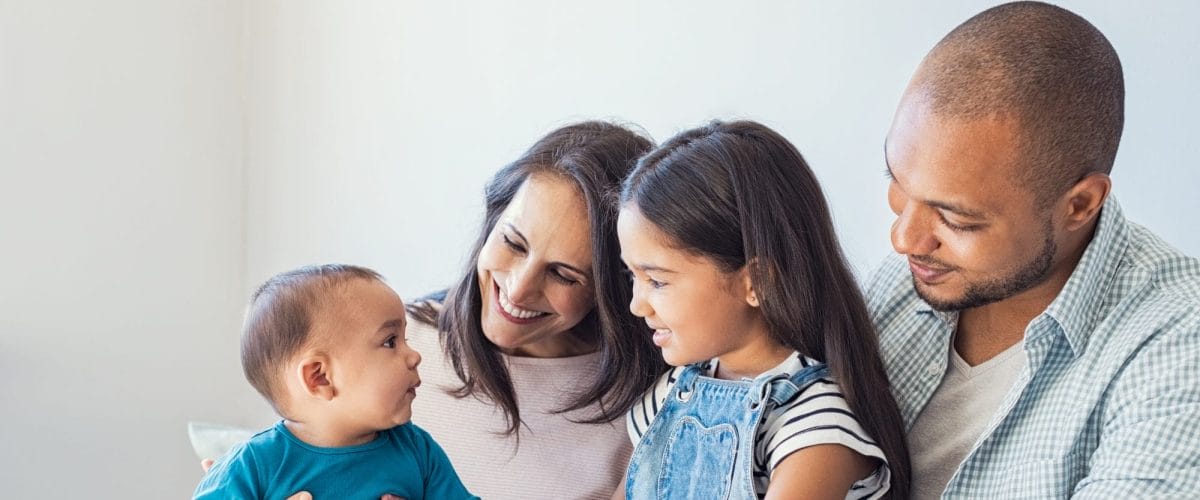 Multiethnic family playing