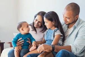 Multiethnic family playing