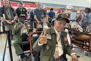 Veterans in chairs in airport