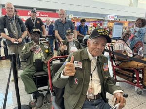 Veterans in chairs in airport
