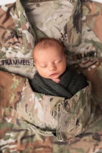 Isabella wrapped in Army uniform