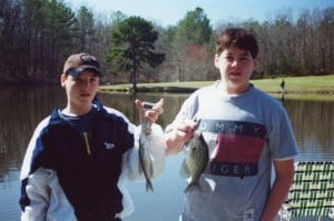 Dominic McMath fishing with his brother